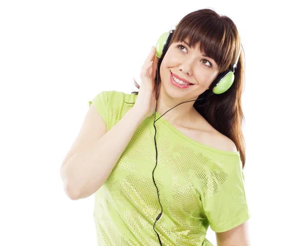 Krásná dívka s zeleným sluchátka — Stock fotografie