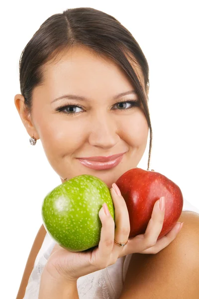 Mladá krásná žena držící dvě jablka — Stock fotografie