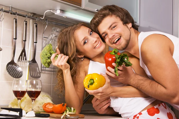 Young romantic couple in the kitchen — Stock Photo, Image