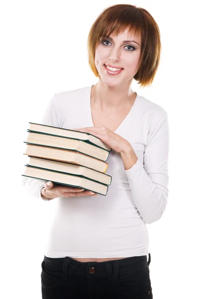 Krásná studentka s Stoh knih — Stock fotografie