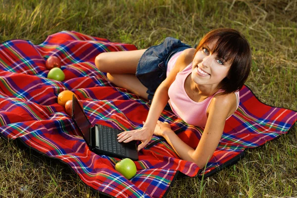 Lovely girl having a rest outdoors — Stock Photo, Image