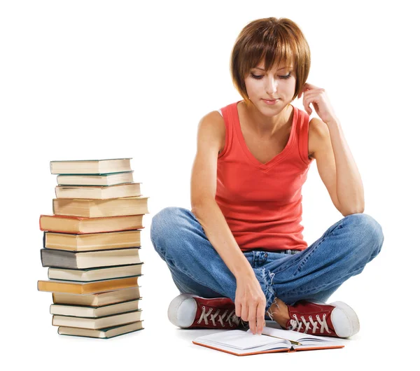 Miloučká studentka s hromadou knih — Stock fotografie