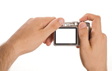 Compact digital photo camera held in hands clipart