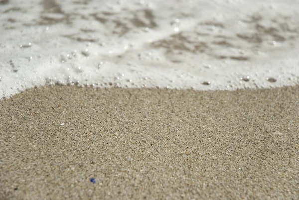 Kum üzerinde hareketli dalga — Stok fotoğraf