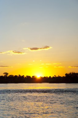 Zambezi river at sunset clipart