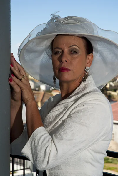 stock image Stylish older woman in white dress