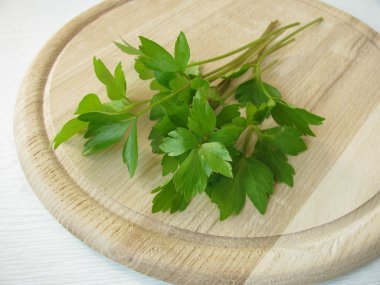 Lovage on cutting board clipart