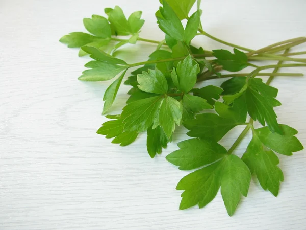 Lovage on cutting board — Stock Photo, Image