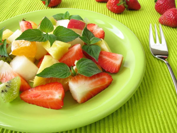 Fruitsalade met honing meloen salie — Stockfoto