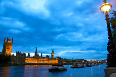 Houses of Parliament over Thames clipart