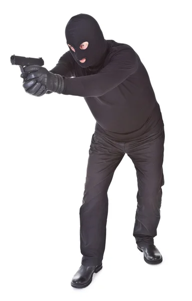 Robber apontando com sua arma — Fotografia de Stock