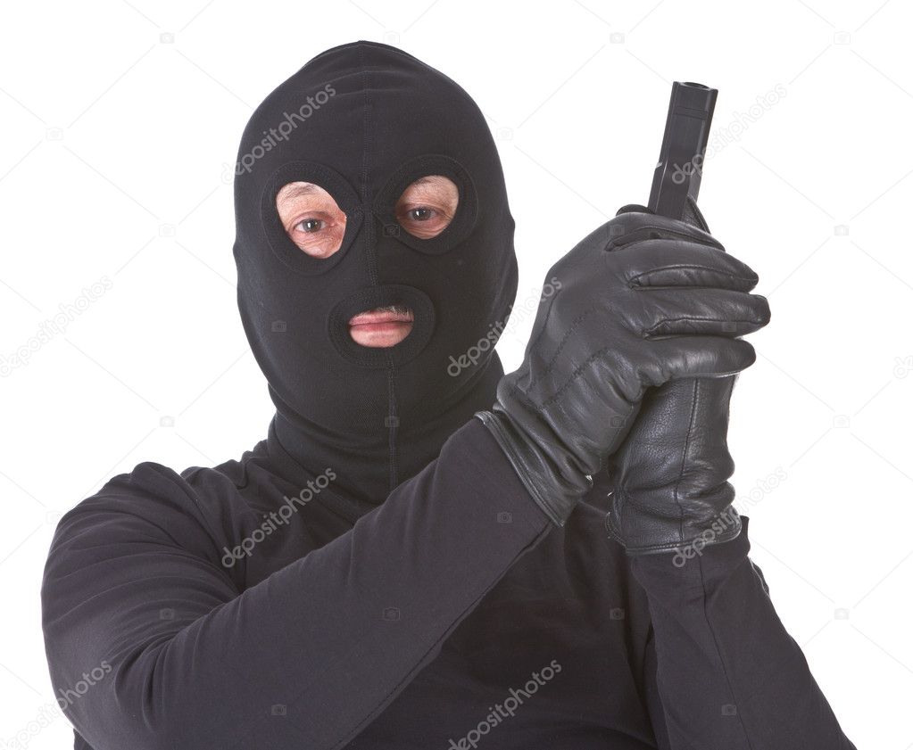 Robber with his gun isolated