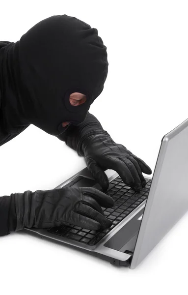Data thief with laptop — Stock Photo, Image