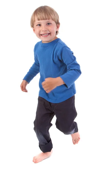 Rapaz feliz correndo sobre branco — Fotografia de Stock