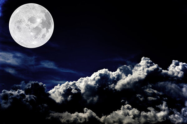 Image of a dark cloudy sky with moon