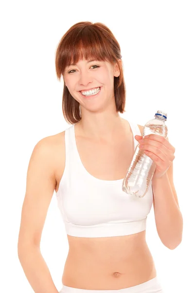 Młoda kobieta lekkoatletycznego z butelka wody — Zdjęcie stockowe