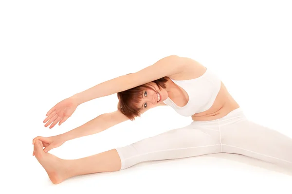 Young beautiful gymnast stretching — Stock Photo, Image