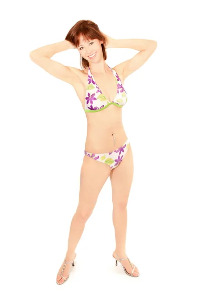 Portret van mooie jonge vrouw in kleurrijke bikini — Stockfoto