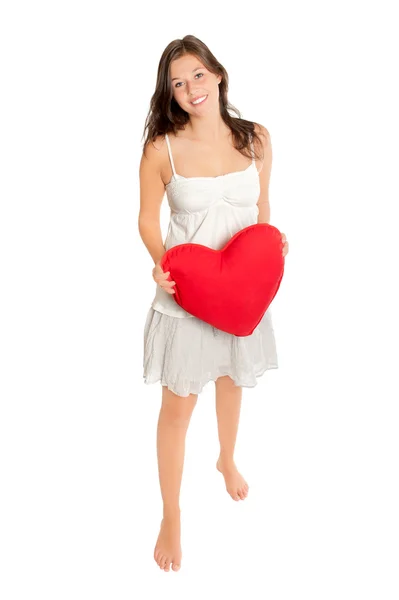 Menina adolescente bonito segurando coração vermelho — Fotografia de Stock