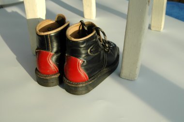 Old childrens shoes clipart