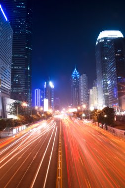 Street in downtown of shenzhen at night clipart