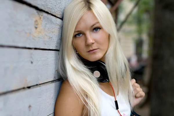 Closeup portrait of a girl with headphones — Stock Photo, Image