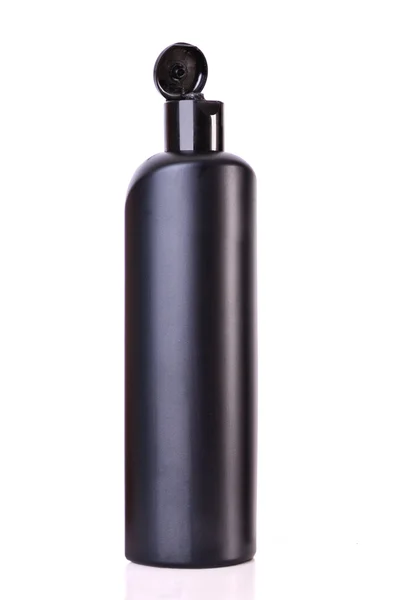 Bottiglia di plastica scura — Foto Stock