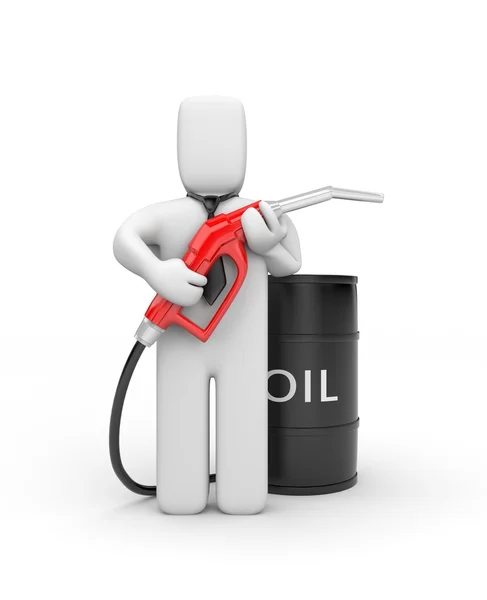 Бизнесмен с газовым насосом и баррелем нефти — стоковое фото