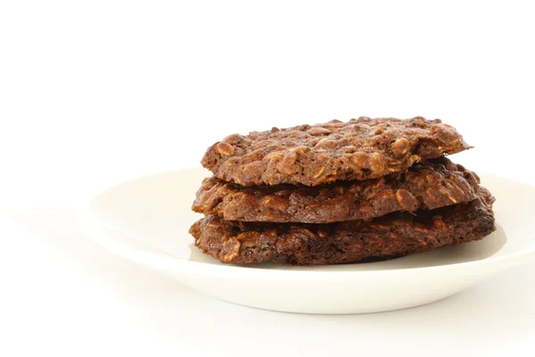 Brown oatmeal cookies on plate — Stock Photo, Image