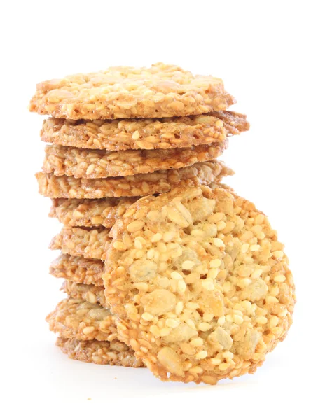 Beyaz zemin üzerinde tam tahıl bisküvi — Stok fotoğraf