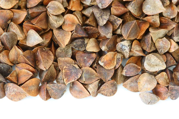Dry raw buckwheat on white background — Stock Photo, Image