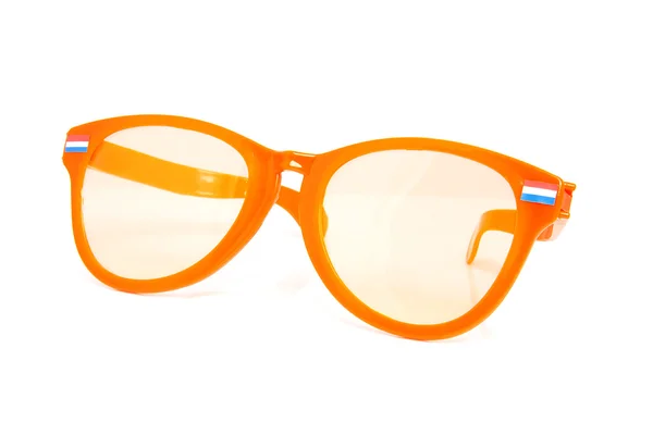 Jeden velký oranžové brýle s duch příznaky — Stock fotografie