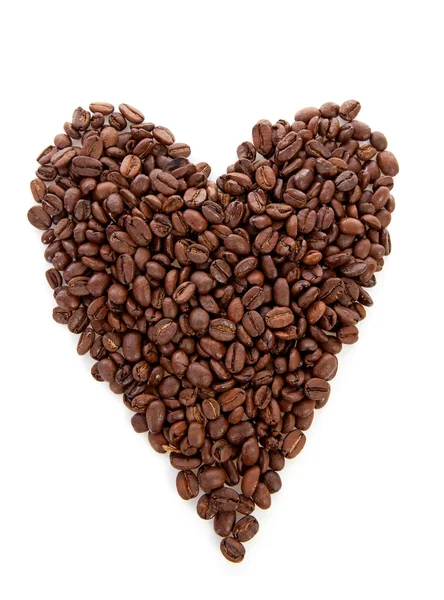 Форма сердца из кофейных зерен — стоковое фото