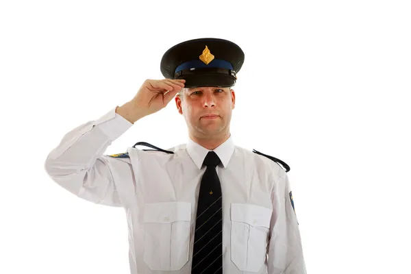 Officier de police avec la main sur la casquette — Photo