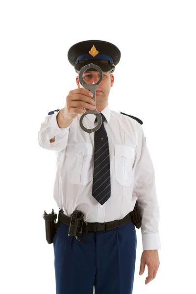 Police officer is showing handcuffs — Stock Photo, Image