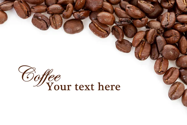 stock image Coffee beans over white with text space