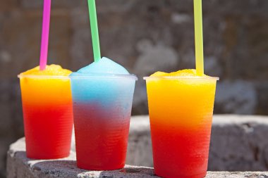 Colorful slushy ice drinks clipart