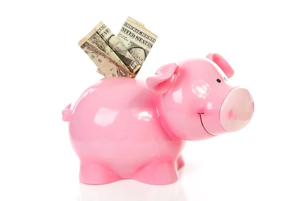 Hucha rosa con dinero en dólares — Foto de Stock
