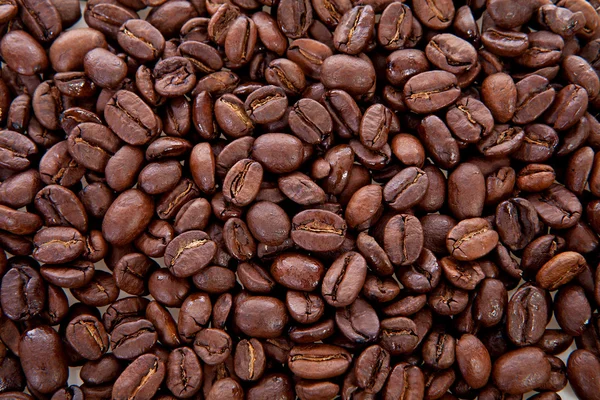 Фон из жареных кофейных зерен — стоковое фото