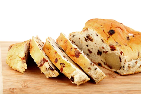 Fette di pane su tagliere di legno — Foto Stock