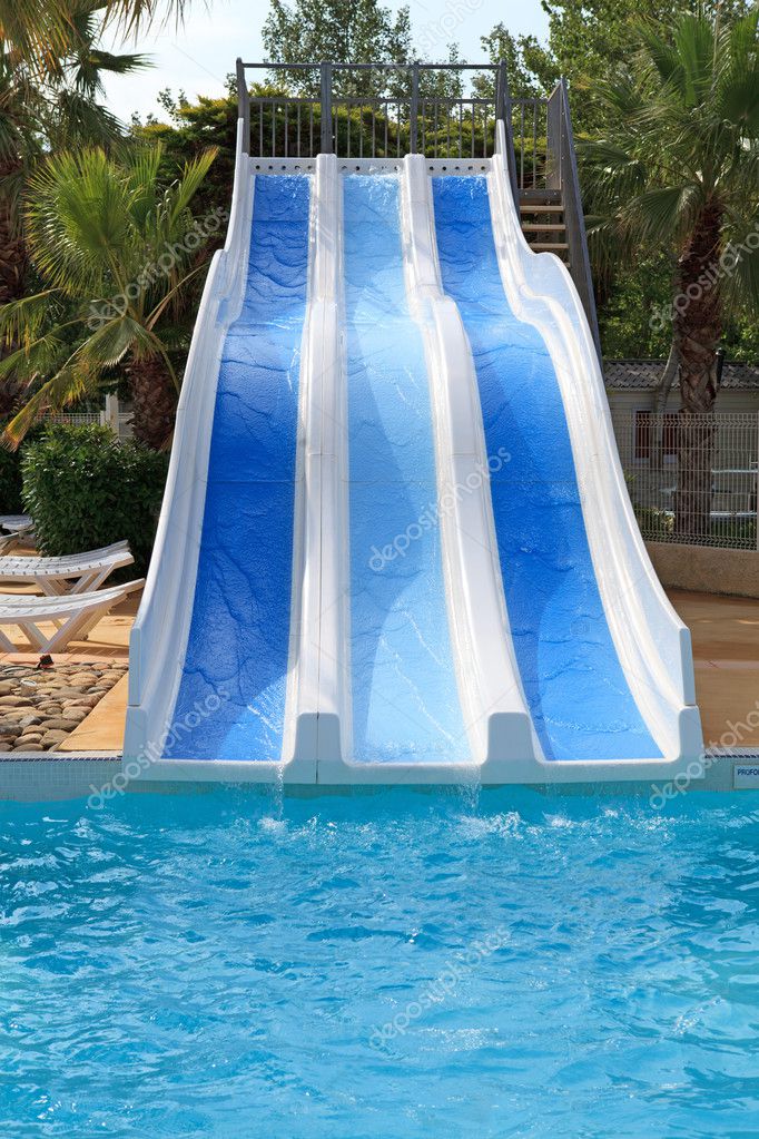 Swimming pool with slides — Stock Photo © sannie32 5803152
