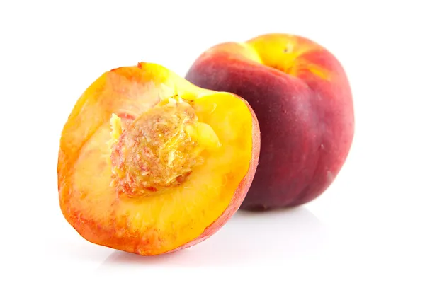 Whole and half peach — Stock Photo, Image