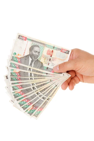 Ręka trzyma kenijski waluty — Zdjęcie stockowe