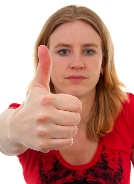 Młoda kobieta wzniesiony kciuki — Zdjęcie stockowe