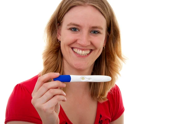 Woman with pregnancy tast is smiling — Stock Photo, Image