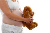 Pregnant belly with Teddy bear