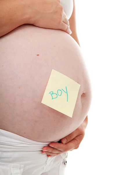 Barriga grávida com nota pegajosa — Fotografia de Stock