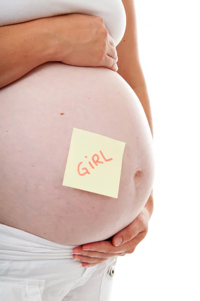 Barriga grávida com nota pegajosa — Fotografia de Stock