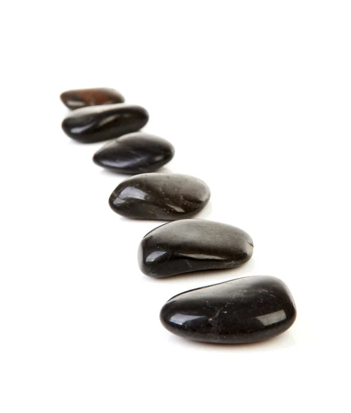 Piedras negras en fila —  Fotos de Stock