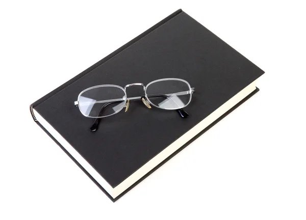 Libro con gafas de lectura — Foto de Stock